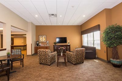 Cozy common area with seating and a television