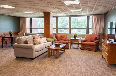 Interior common area with seating and large windows