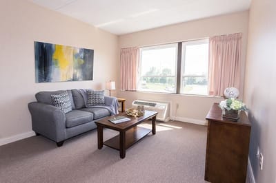 Cozy living space with a couch and window view