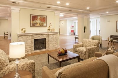 Common area with comfortable seating and a fireplace
