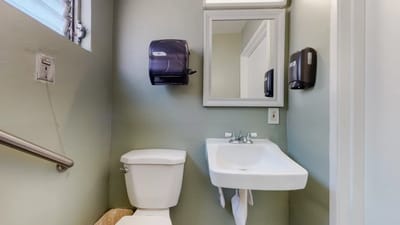 Small restroom with a toilet and sink
