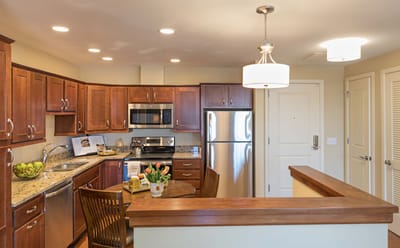 Modern kitchen area in a senior living apartment