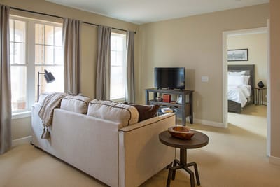 Cozy interior living space with a sofa and TV