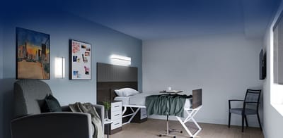 Bright and modern resident room with furnishings