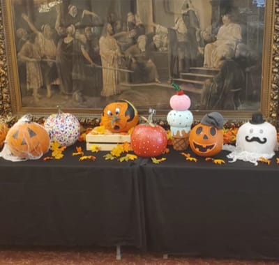Decorated pumpkins on a table during a festive event