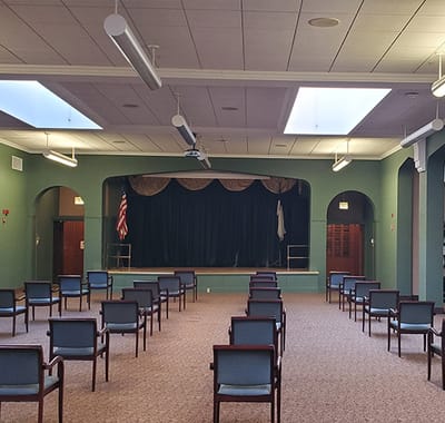 Interior view of the activity room with chairs arranged