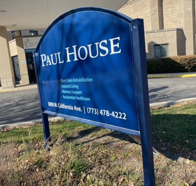 Sign for Paul House at the facility entrance