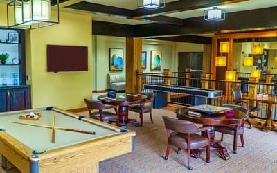 Interior common area with a pool table and seating