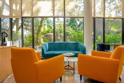 Bright interior seating area with large windows