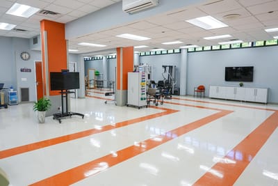 Bright therapy room with modern equipment