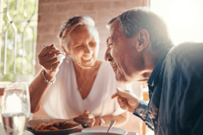 Couple enjoying a meal together in a dining area