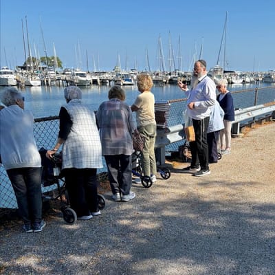 Residents enjoying a day by the marina