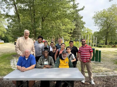 Residents and staff enjoying an outdoor activity together