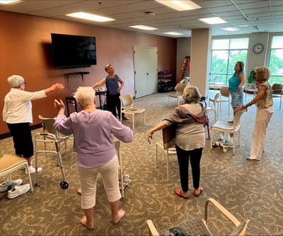 Residents participating in a group exercise class