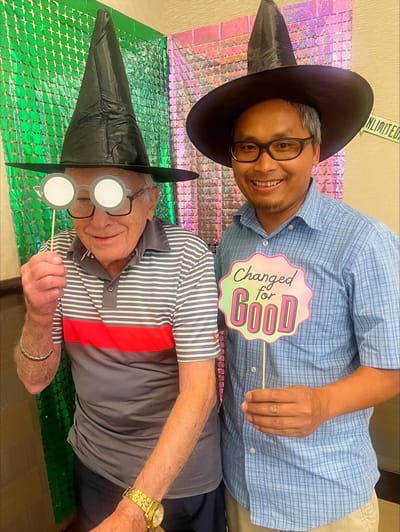 Residents celebrating with props during an event
