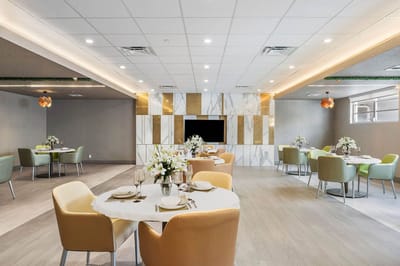 Elegant dining room setup in a senior living facility