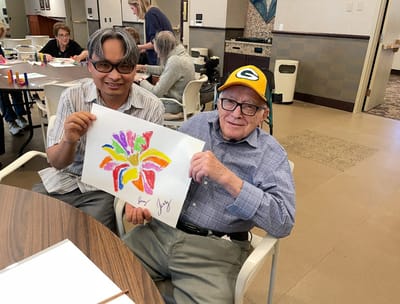 Residents engaged in an art activity