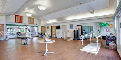 Rehabilitation room with exercise equipment and space