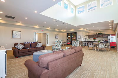 Bright common area with seating and decor
