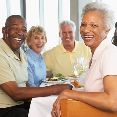 Residents enjoying lunch together in the dining room