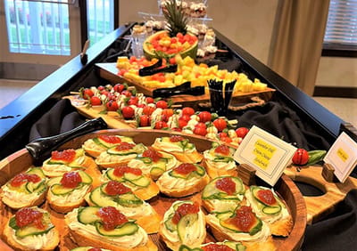 A beautifully arranged food display for a dining event