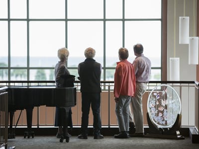 Residents enjoying the view from a common area