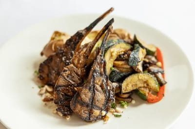 Grilled lamb chops with vegetables on a plate