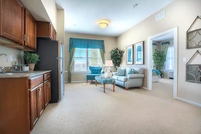 Bright and inviting living area of a resident room
