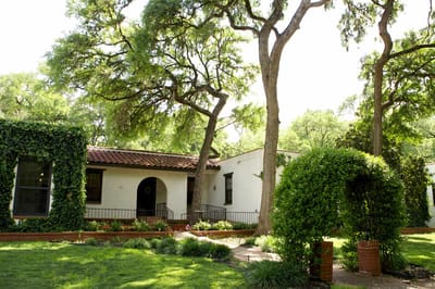 Exterior view of a well-maintained building with trees