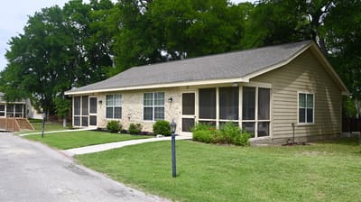 Exterior view of a single-story facility building.