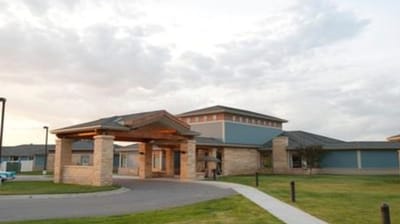 Exterior view of the facility building entrance.