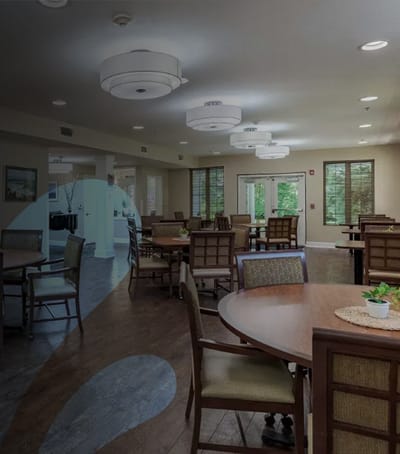 Bright common area with tables and chairs