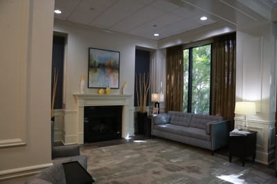 Interior view of a cozy common area with seating