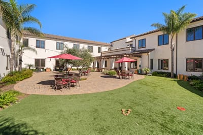 Outdoor courtyard with seating and umbrellas