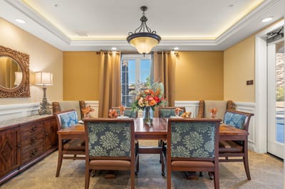 Cozy dining room setting with flowers and decor