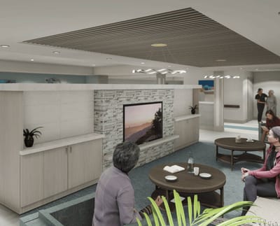 Residents engaging in a common area inside the facility