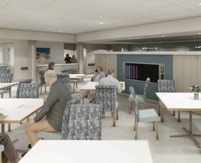 Residents socializing in a light-filled dining room