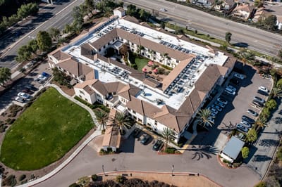 Aerial view of Westmont Village Homes with outdoor space