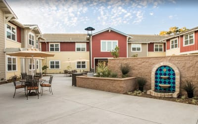 Courtyard area with seating and decorative fountain