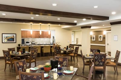 Bright dining area with tables set for a meal