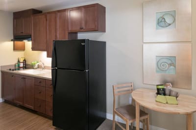 Cozy kitchenette area in a senior living unit