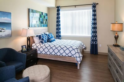 Cozy and stylish resident bedroom with natural light
