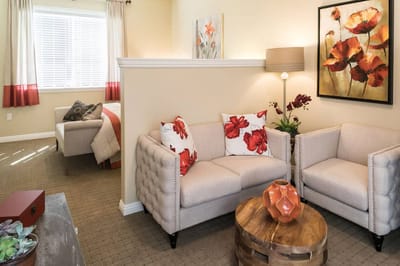 Cozy living area with floral decor and seating