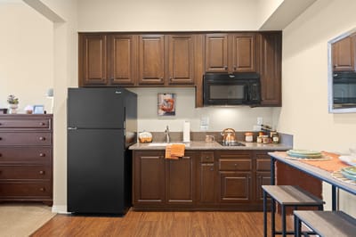 Cozy kitchenette area in a senior living unit