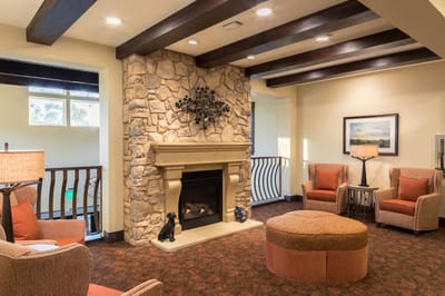 Cozy common area with seating and a fireplace