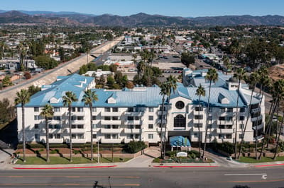 Aerial view of Westmont of Escondido building with palm trees