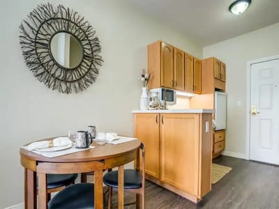 Cozy interior view of a resident room with dining area