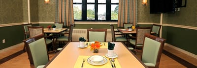 Dining area with tables set for meals