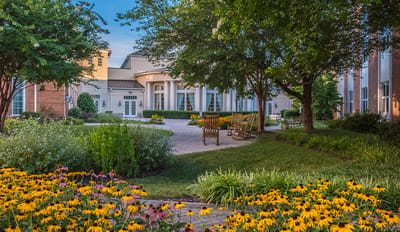 Beautiful outdoor garden area with seating and flowers
