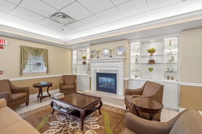 Cozy common area with seating and fireplace.